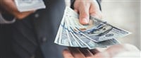 Businessman giving or paying money, US dollar bills - web banner — Photo